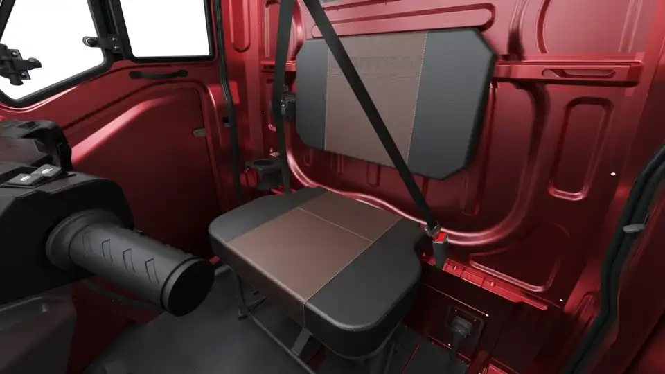 Interior shot of Montra Electric Super Cargo highlighting storage space